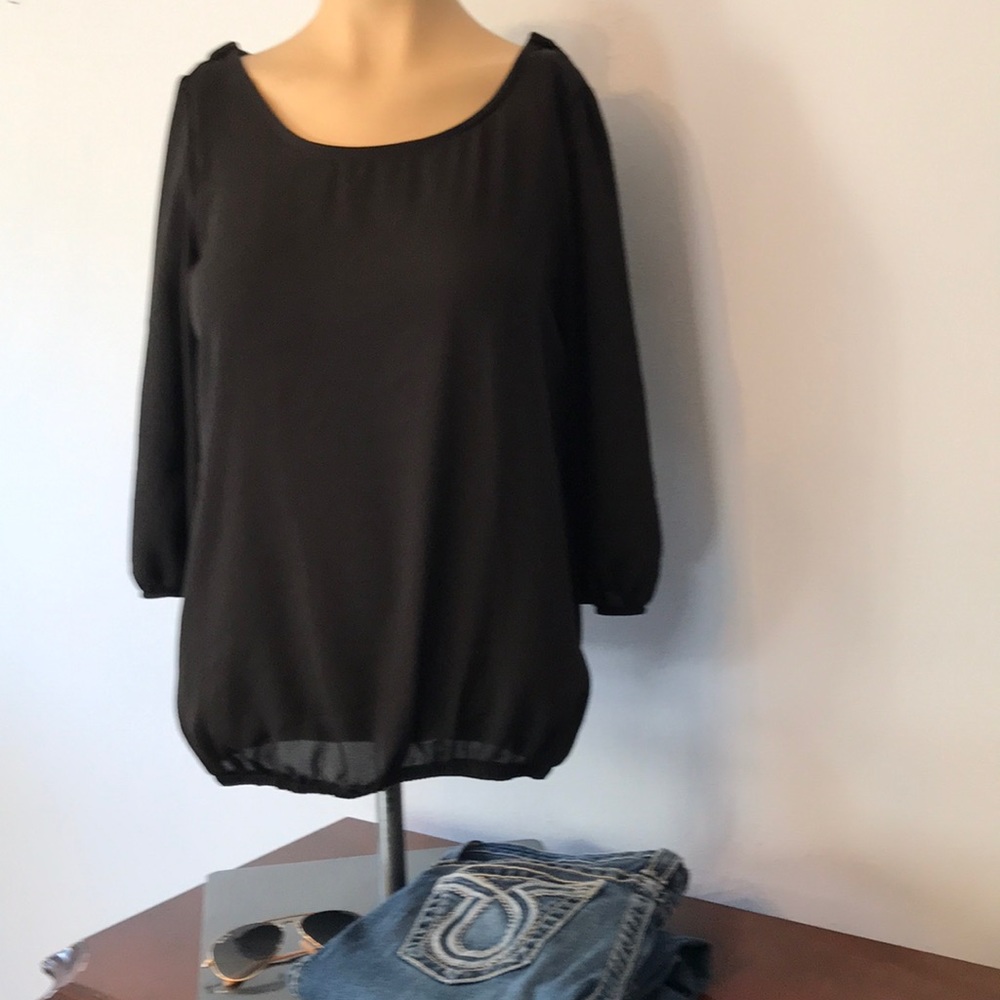 Black blouse w red bow in back